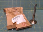 Am General Steel Engine Poppet Valve, Pn: 11640819, Nsn: 2805-00-917-0709 New. Price: $420.00.