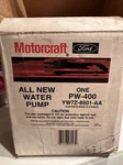 Ford Motorcraft YW7Z-8501-AA Water Pump Assembly (nos) New. Price: $50.00.