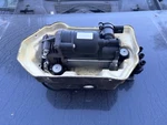 Genuine Rivian R1 Air Suspension Compressor, Valve Block, Mounting Assembly Used. Price: $550.00.