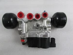 Mclaren MP4-12C, Shock Absorber Valve Block, Used, P/n 11B0209CP.02. Price: $2500.00.